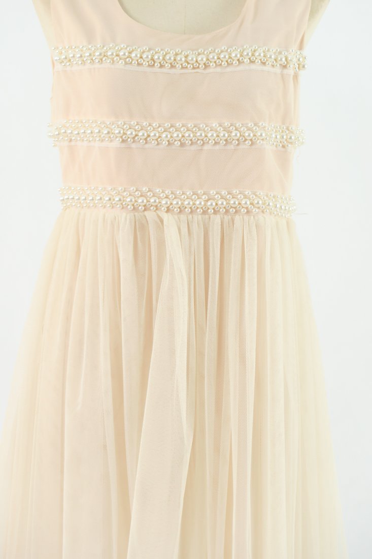 เดรสคอกลมเเขนในตัว - Sleeveless A-Line Dress